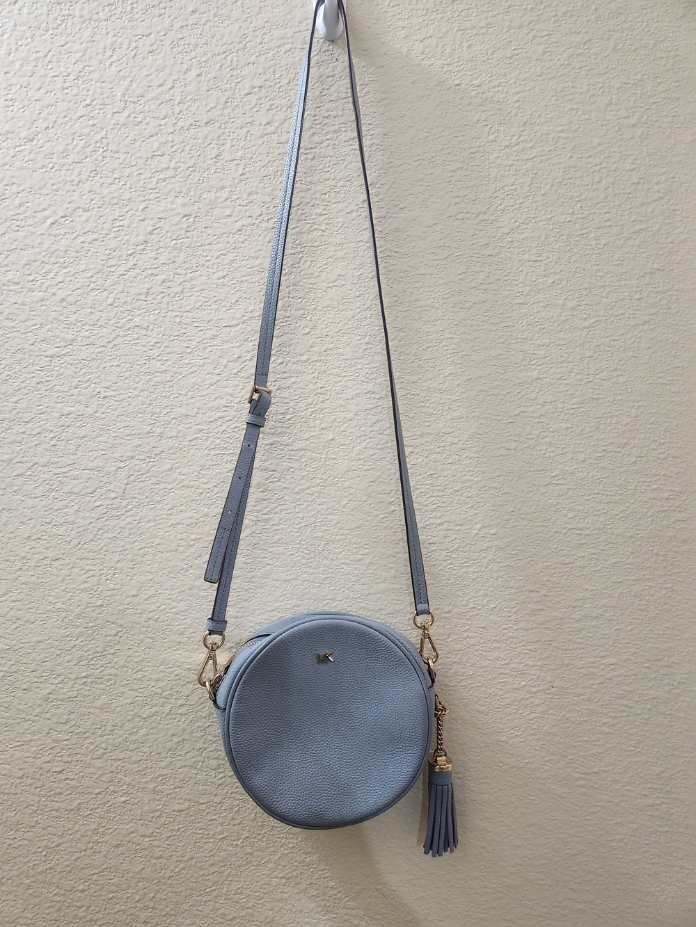 Michael Kors Round Crossbody Bag in Light Blue with Tassel